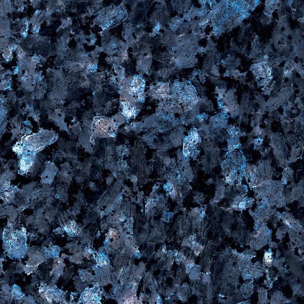 Close-up of dark granite with iridescent blue crystal patches